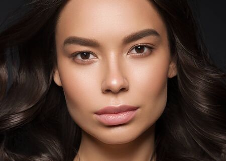 Red lips woman beauty face asian female. Studio shot.の写真素材