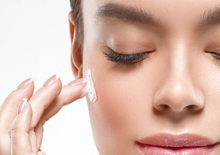 Asia beauty woman healthy skin face clean fresh skin spa. Studio shot. Isolated on white.の写真素材