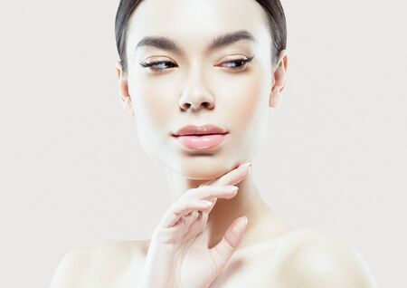 Asia beauty woman healthy skin face clean fresh skin spa. Studio shot. Color background.の写真素材