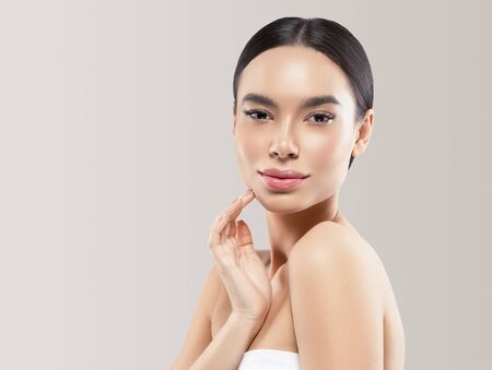Asia beauty woman healthy skin face clean fresh skin spa. Studio shot. Color background.の写真素材