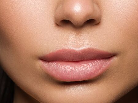 Red lips woman beauty face asian female. Studio shot.の写真素材
