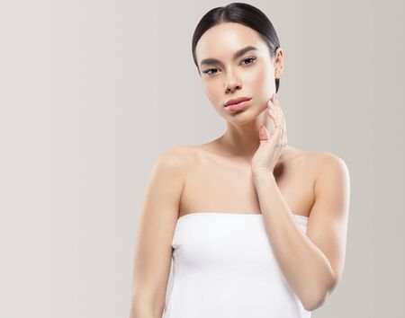 Asia beauty woman healthy skin face clean fresh skin spa. Studio shot. Color background.の写真素材