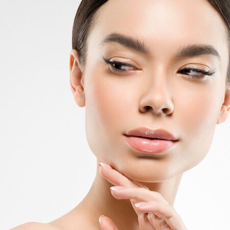 Asia beauty woman healthy skin face clean fresh skin spa. Studio shot. Isolated on white.の写真素材