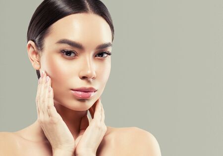 Asia beauty woman healthy skin face clean fresh skin spa. Studio shot. Color background.の写真素材