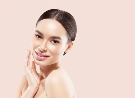 Asia beauty woman healthy skin face clean fresh skin spa. Studio shot. Color background.の写真素材