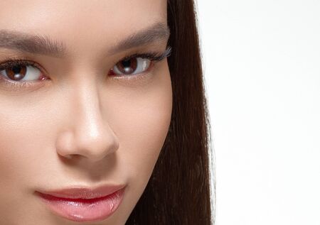Asian beauty woman face beautiful healthy skin isolated on white.  Studio shot.の写真素材