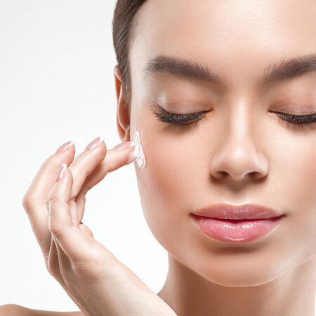 Asia beauty woman healthy skin face clean fresh skin spa. Studio shot. Isolated on white.の写真素材