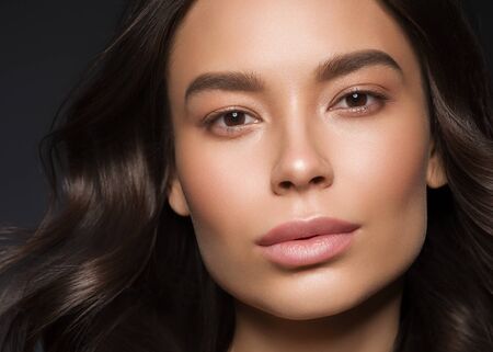 Red lips woman beauty face asian female. Studio shot.の写真素材