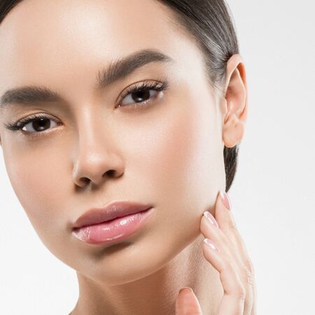 Asia beauty woman healthy skin face clean fresh skin spa. Studio shot. Isolated on white.の写真素材