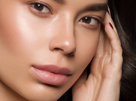 Red lips woman beauty face asian female. Studio shot.の写真素材