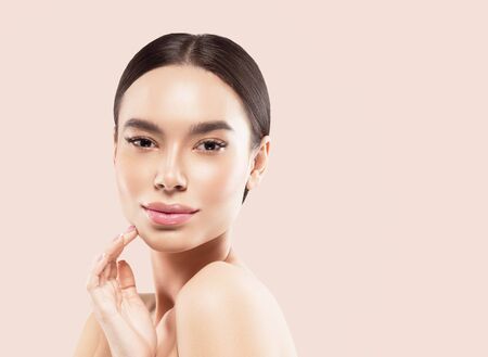 Asia beauty woman healthy skin face clean fresh skin spa. Studio shot. Color background.の写真素材