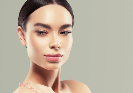 Asia beauty woman healthy skin face clean fresh skin spa. Studio shot. Color background.の写真素材