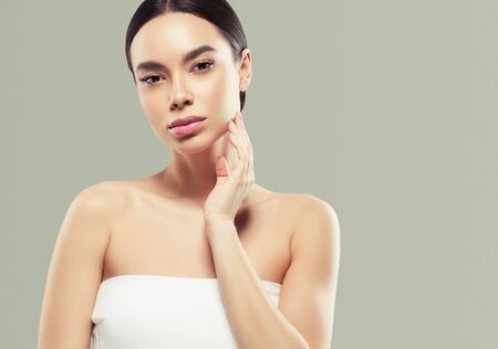 Asia beauty woman healthy skin face clean fresh skin spa. Studio shot. Color background.の写真素材