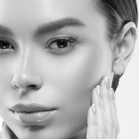 Asia beauty woman healthy skin face clean fresh skin spa. Studio shot.  Monochrome. Gray. Black and white.の写真素材