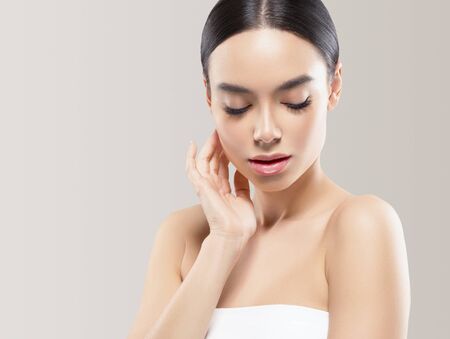 Asia beauty woman healthy skin face clean fresh skin spa. Studio shot. Color background.の写真素材