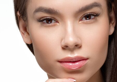 Asian beauty woman face beautiful healthy skin isolated on white.  Studio shot.の写真素材