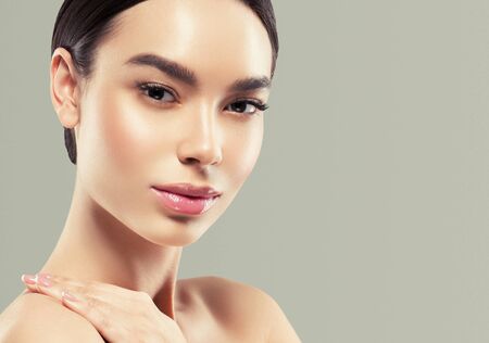 Asia beauty woman healthy skin face clean fresh skin spa. Studio shot. Color background.の写真素材