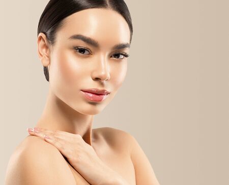 Asia beauty woman healthy skin face clean fresh skin spa. Studio shot. Color background.の写真素材