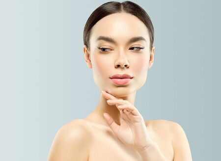 Asia beauty woman healthy skin face clean fresh skin spa. Studio shot. Color background.の写真素材