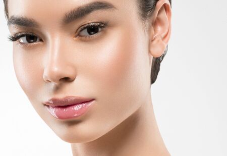Asia beauty woman healthy skin face clean fresh skin spa. Studio shot. Isolated on white.の写真素材