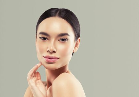 Asia beauty woman healthy skin face clean fresh skin spa. Studio shot. Color background.の写真素材