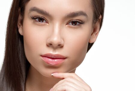 Asian beauty woman face beautiful healthy skin isolated on white.  Studio shot.の写真素材