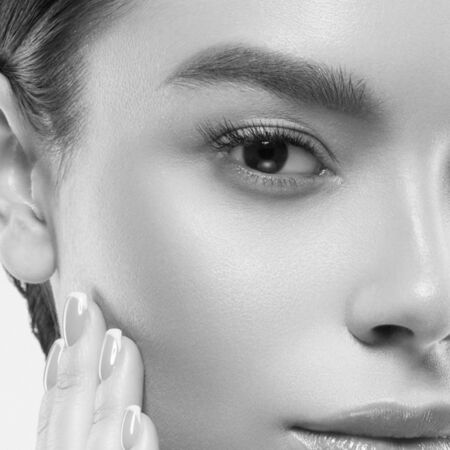 Asia beauty woman healthy skin face clean fresh skin spa. Studio shot.  Monochrome. Gray. Black and white.の写真素材