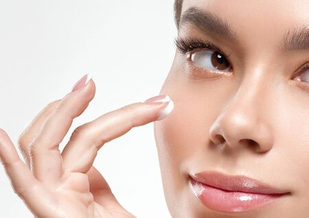Asia beauty woman healthy skin face clean fresh skin spa. Studio shot. Isolated on white.の写真素材