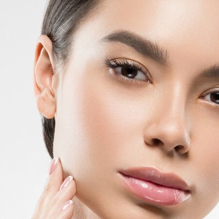 Asia beauty woman healthy skin face clean fresh skin spa. Studio shot. Isolated on white.の写真素材