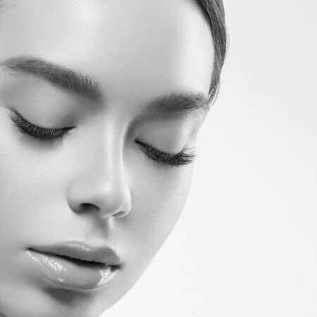 Asia beauty woman healthy skin face clean fresh skin spa. Studio shot.  Monochrome. Gray. Black and white.の写真素材