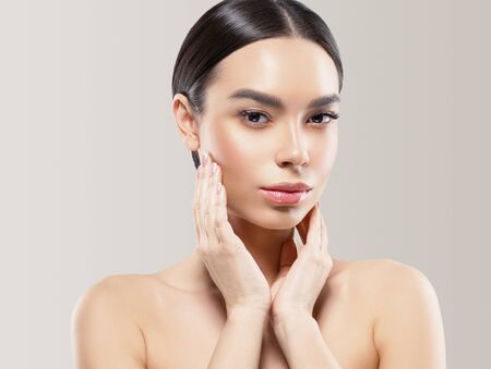 Asia beauty woman healthy skin face clean fresh skin spa. Studio shot. Color background.の写真素材