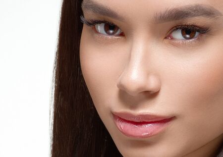 Asian beauty woman face beautiful healthy skin isolated on white.  Studio shot.の写真素材
