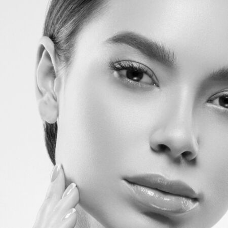 Asia beauty woman healthy skin face clean fresh skin spa. Studio shot.  Monochrome. Gray. Black and white.の写真素材