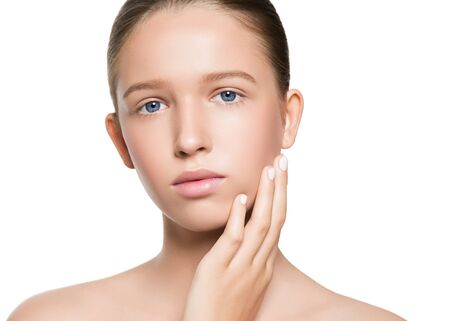 Long smooth hair clean skin girl healthy skin care natural makeup female portrait isolated on white. Studio shot.の写真素材