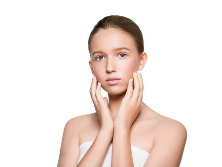 Long smooth hair clean skin girl healthy skin care natural makeup female portrait isolated on white. Studio shot.の写真素材