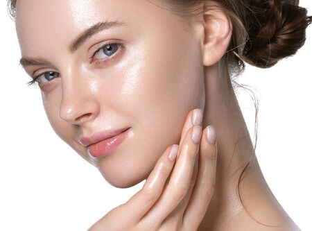 Hydration skin woman beauty healthy clean skin face beautiful model neck and shoulders isolated on white. Studio shot.の写真素材