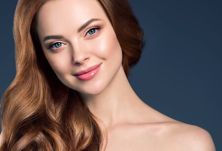 Beauty hair woman curly hairstyle natural makeup. Studio shot.の写真素材