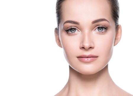 Woman beauty face healthy skin natural makeup beautiful young model. Studio shot.の写真素材