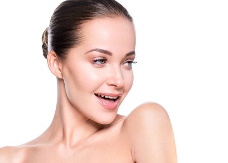 Woman beauty face healthy skin natural makeup beautiful young model. Studio shot.の写真素材