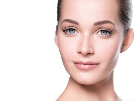 Woman beauty face healthy skin natural makeup beautiful young model. Studio shot.の写真素材