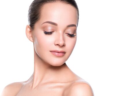 Woman beauty face healthy skin natural makeup beautiful young model. Studio shot.の写真素材