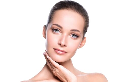 Woman beauty face healthy skin natural makeup beautiful young model. Studio shot.の写真素材