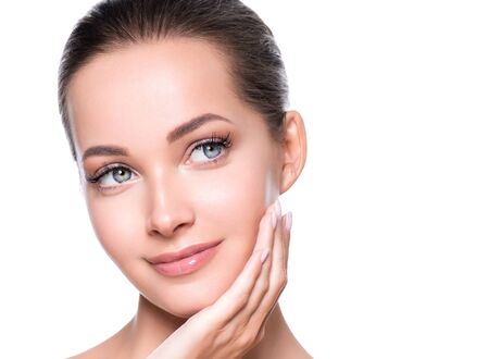 Woman beauty face healthy skin natural makeup beautiful young model. Studio shot.の写真素材
