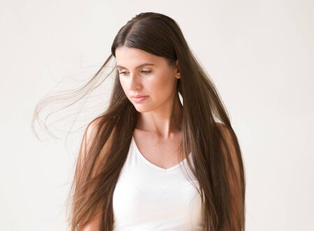 Woman casual portrait brunette female long hair natural make upの写真素材