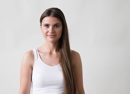 Woman casual portrait brunette female long hair natural make upの写真素材