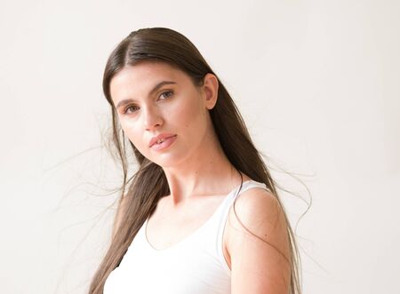Woman casual portrait brunette female long hair natural make upの写真素材