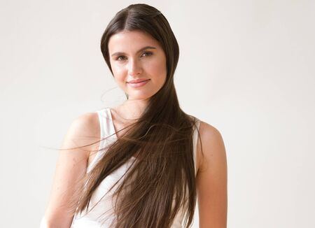 Woman casual portrait brunette female long hair natural make upの写真素材