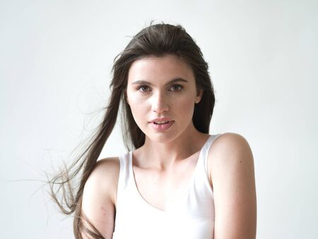 Woman casual portrait brunette female long hair natural make upの写真素材