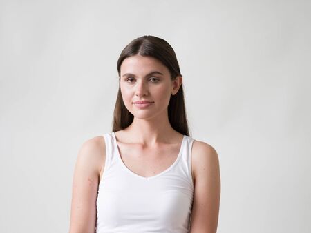 Woman casual portrait brunette female long hair natural make upの写真素材