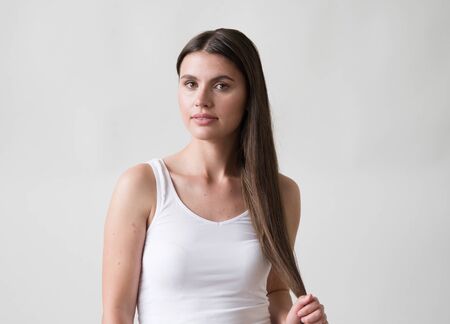 Woman casual portrait brunette female long hair natural make upの写真素材